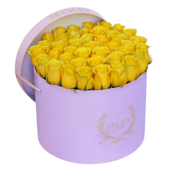 Yellow Roses in Large Pink Suede Box