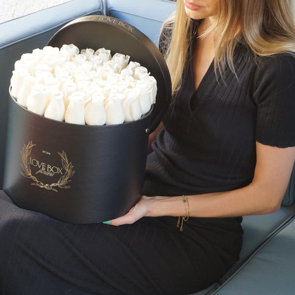 White Roses in Large Black Box