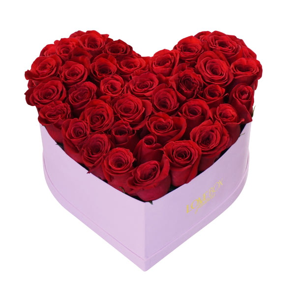 Red Roses in Large Pink Suede Heart Box