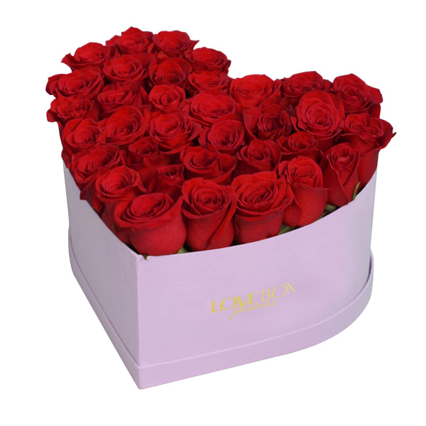 Red Roses in Large Pink Suede Heart Box