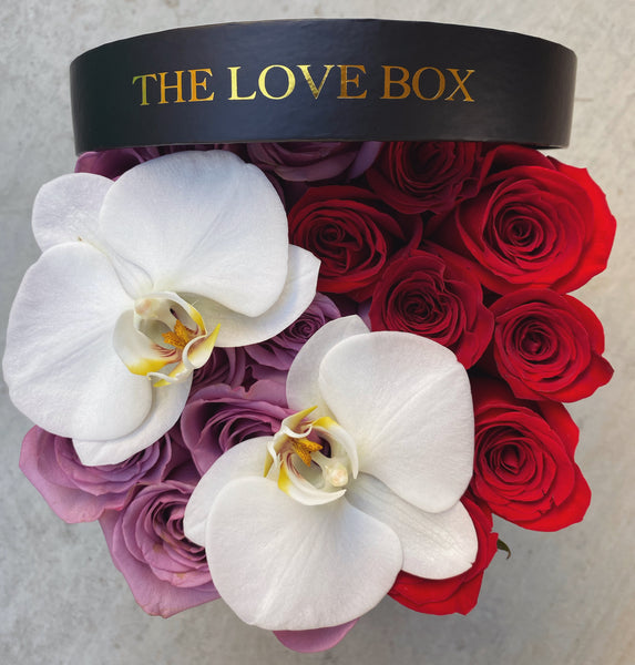 Mixed Roses With Orchid Flowers in Medium Box