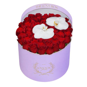 Red Roses with Orchid Flowers in Large Pink Suede Box