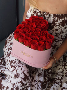 Red Roses in Medium Pink Suede Heart Box