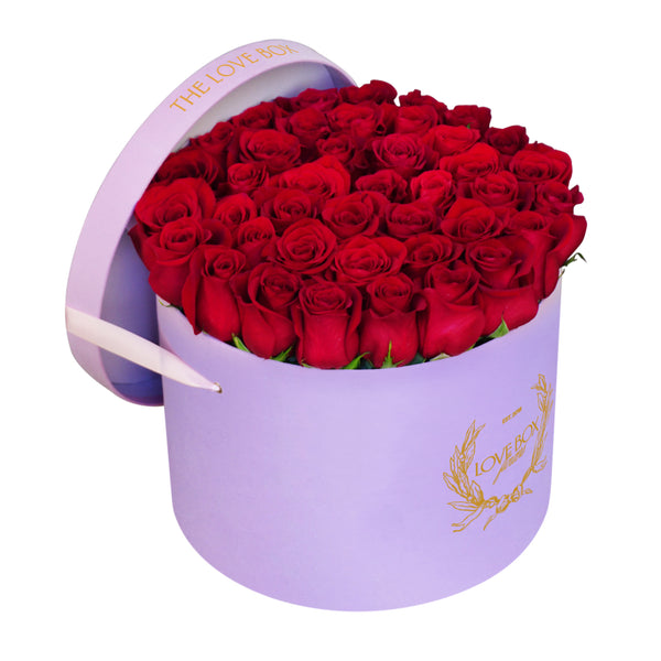 Classic Red Roses in Large Pink Suede Box